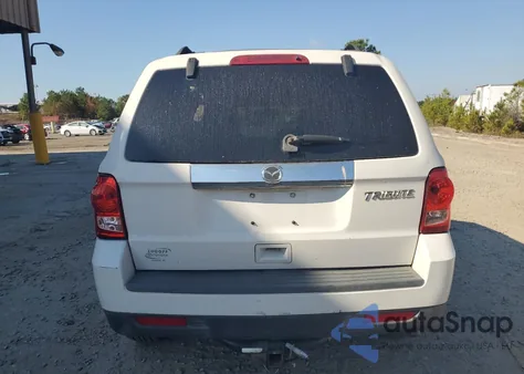 2010 Mazda Tribute I z USA, uszkodzony, nr VIN 4F2CY0C72AKM10013